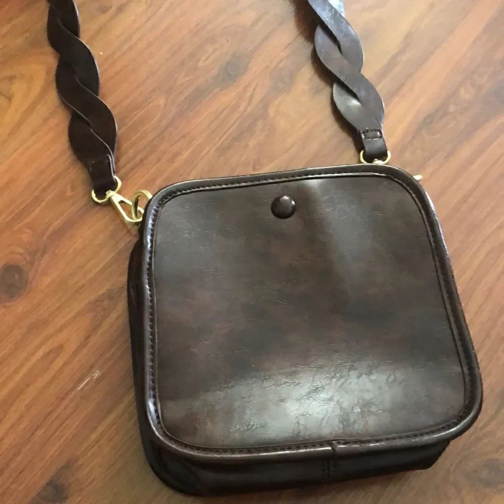 Anthropologie Tortoiseshell brown Crossbody bag.